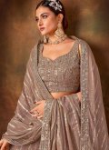 Brown color Faux Georgette A Line Lehenga Choli with Embroidered - 1