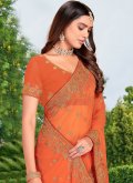 Charming Peach Georgette Embroidered Traditional Saree for Engagement - 1