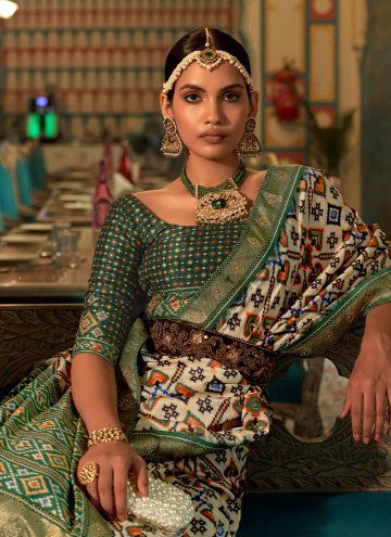 Cream and Green Patola Silk Woven Contemporary Saree for Reception