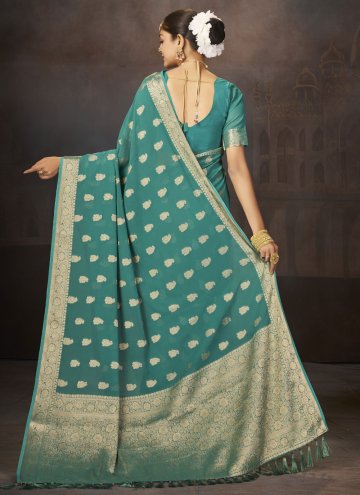 Dazzling Turquoise Faux Georgette Woven Trendy Saree for Ceremonial