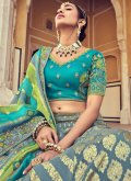 Dazzling Turquoise Silk Beads A Line Lehenga Choli for Engagement - 1