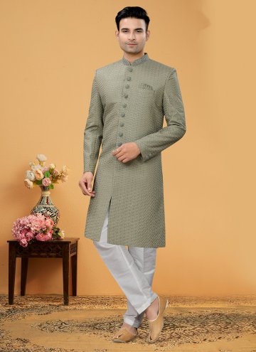 Fancy Fabric Indo Western Sherwani in Green Enhanced with Hand Work