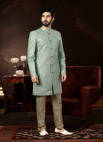 Fancy Fabric Sherwani in Green Enhanced with Embroidered