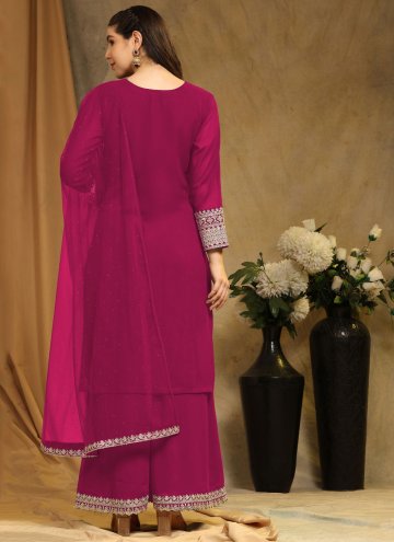 Faux Georgette Palazzo Suit in Rani Enhanced with Embroidered