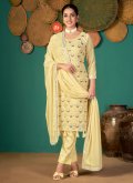 Faux Georgette Pant Style Suit in Yellow Enhanced with Embroidered - 1