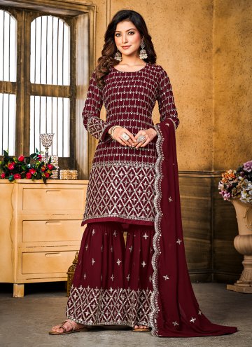 Faux Georgette Straight Salwar Kameez in Maroon Enhanced with Embroidered