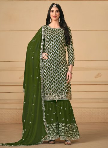 Faux Georgette Trendy Salwar Kameez in Green Enhanced with Embroidered