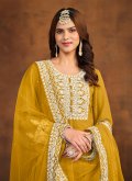 Faux Georgette Trendy Salwar Kameez in Mustard Enhanced with Embroidered - 1