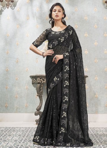 Faux Georgette Trendy Saree in Black Enhanced with