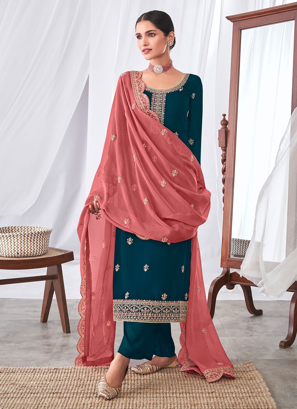 Georgette Pakistani Suit in Teal Enhanced with Embroidered