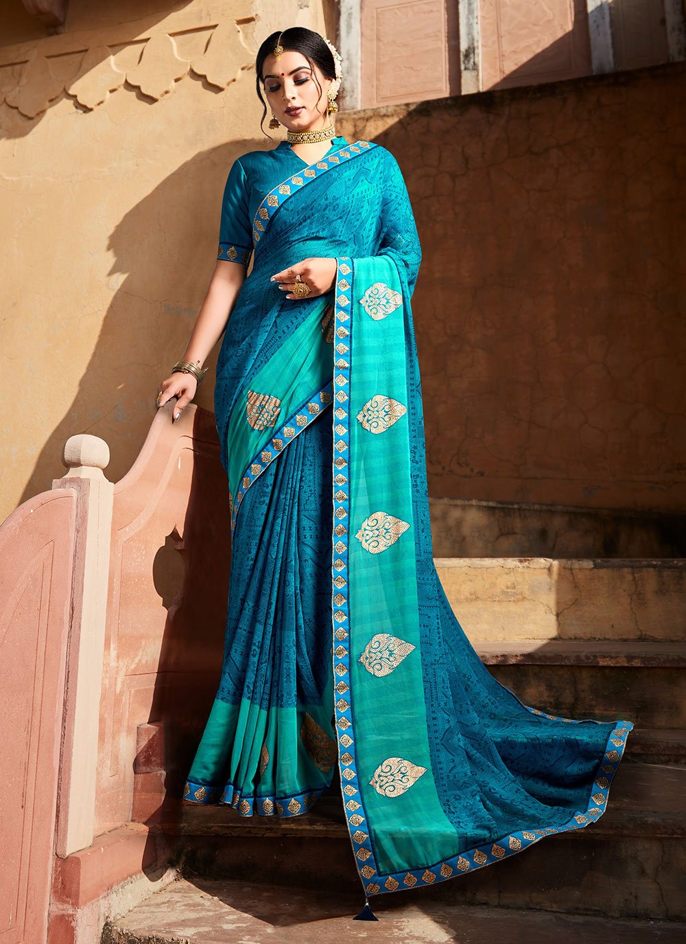 Georgette Printed Sarees in Blue Enhanced with Abstract Print