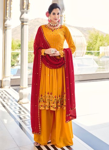 Georgette Salwar Suit in Mustard Enhanced with Emb