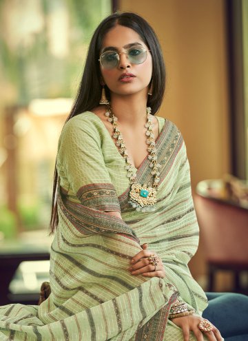Georgette Traditional Saree in Green Enhanced with Sequins Work