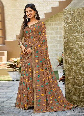 Georgette Trendy Saree in Brown Enhanced with Bord