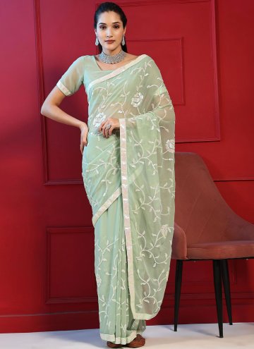 Georgette Trendy Saree in Green Enhanced with Embr