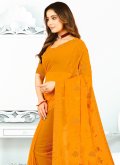 Georgette Trendy Saree in Orange Enhanced with Border - 1