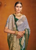 Gratifying Green and Grey Pure Georgette Woven Trendy Saree for Ceremonial - 1