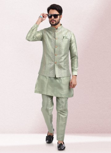 Green color Art Banarasi Silk Kurta Payjama With Jacket with Embroidered