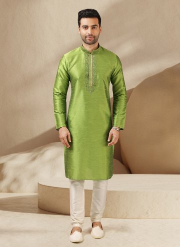 Green color Art Banarasi Silk Kurta Pyjama with Em
