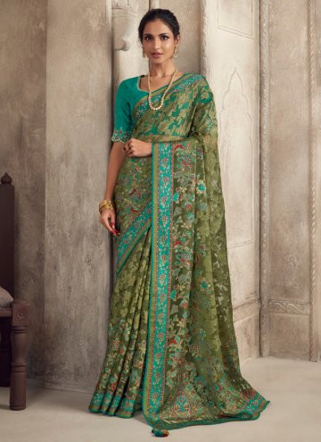 Green color Brasso Contemporary Saree with Patch Border Work