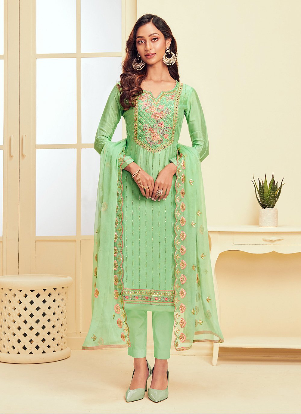Green color Embroidered Faux Georgette Pant Style Suit