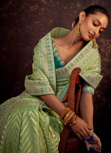 Green color Fancy Fabric Contemporary Saree with Border