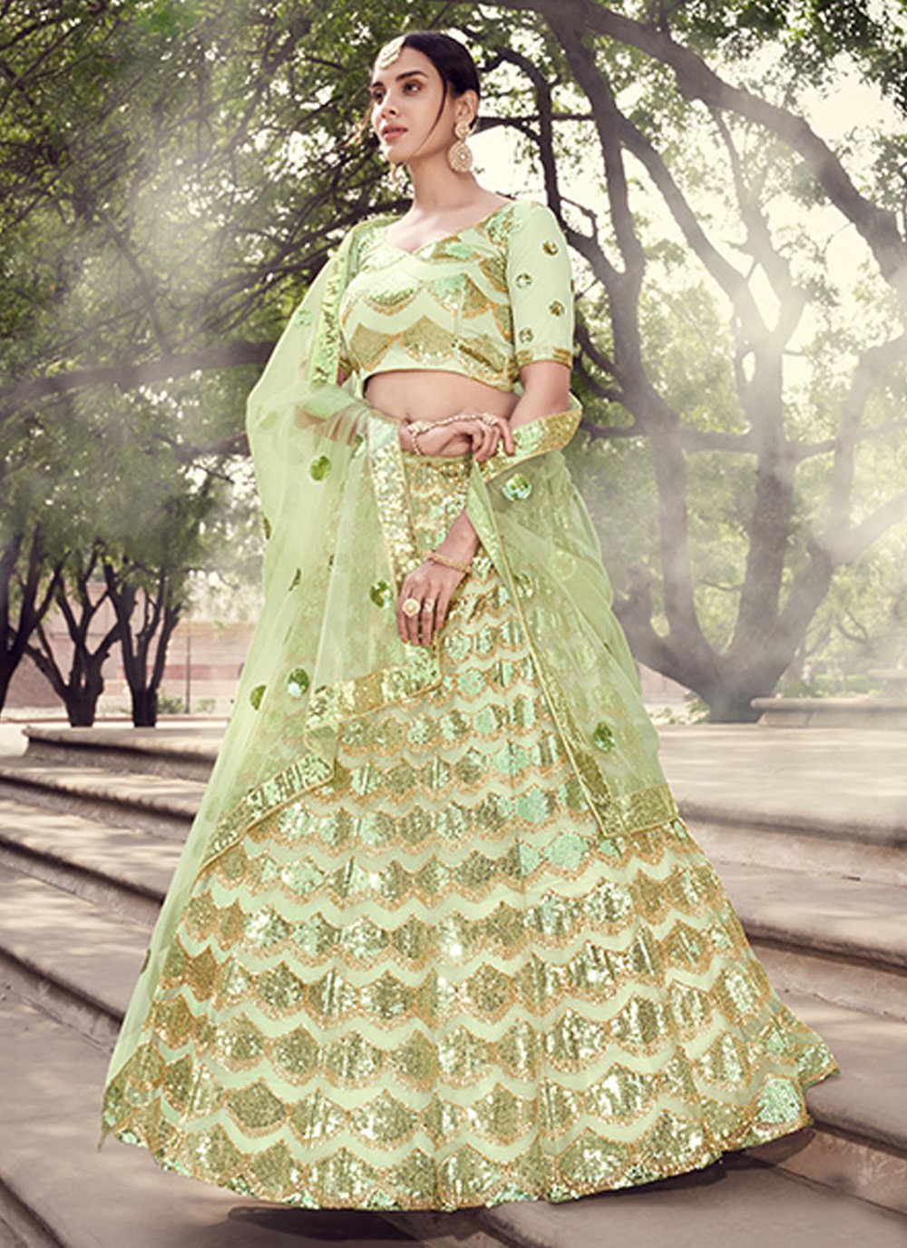 Green color Net Lehenga Choli with Sequins Work
