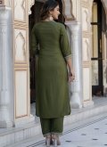Green color Rayon Salwar Suit with Embroidered - 1