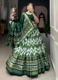 Green color Tussar Silk Lehenga Choli with Foil Print - 3
