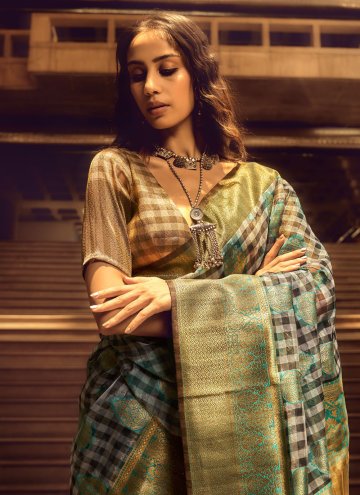 Handloom Silk Trendy Saree in Green Enhanced with Woven