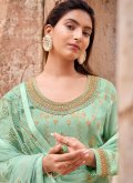 Jacquard Trendy Salwar Kameez in Green Enhanced with Embroidered - 1