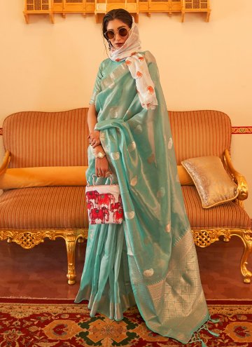 Linen Contemporary Saree in Green Enhanced with Woven