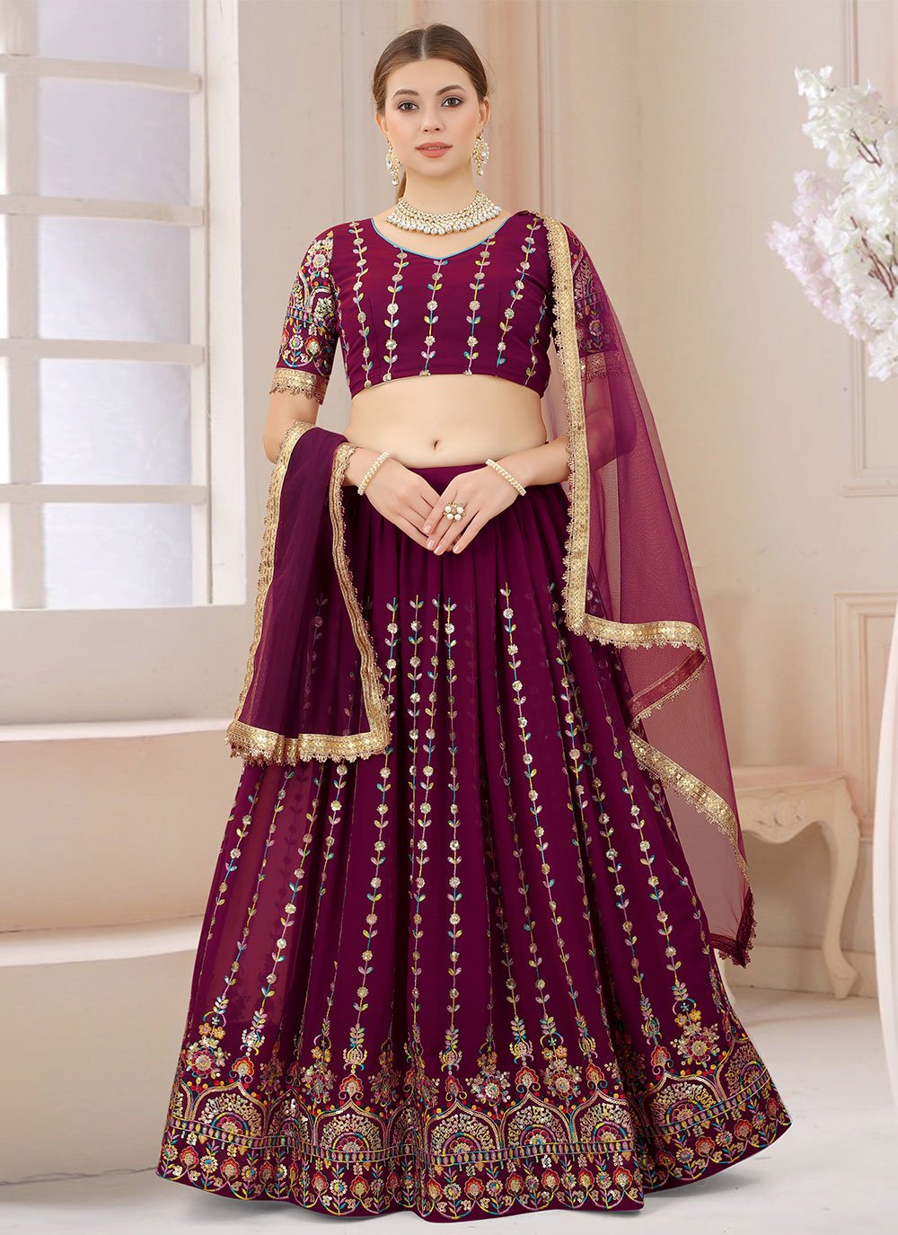 Maroon color Faux Georgette A Line Lehenga Choli with Stone Work