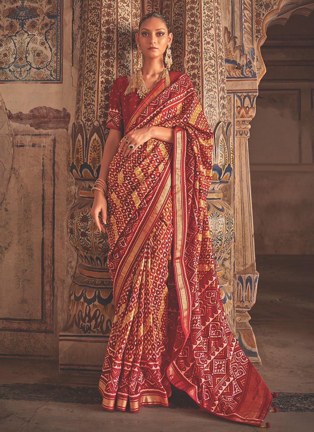 Maroon color Patola Silk Classic Designer Saree with Woven