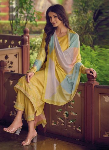 Muslin Straight Salwar Kameez in Yellow Enhanced with Embroidered