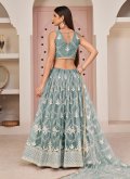 Net A Line Lehenga Choli in Blue Enhanced with Embroidered - 3