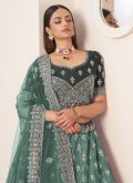Net A Line Lehenga Choli in Green Enhanced with Embroidered - 1