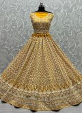Net A Line Lehenga Choli in Mustard Enhanced with Embroidered - 1