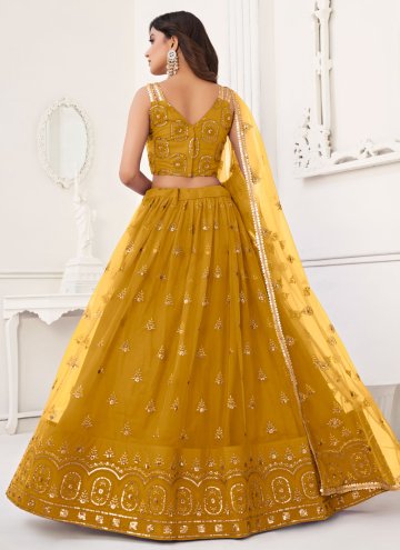 Net A Line Lehenga Choli in Mustard Enhanced with Embroidered
