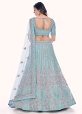 Net A Line Lehenga Choli in Turquoise Enhanced with Dori Work - 1