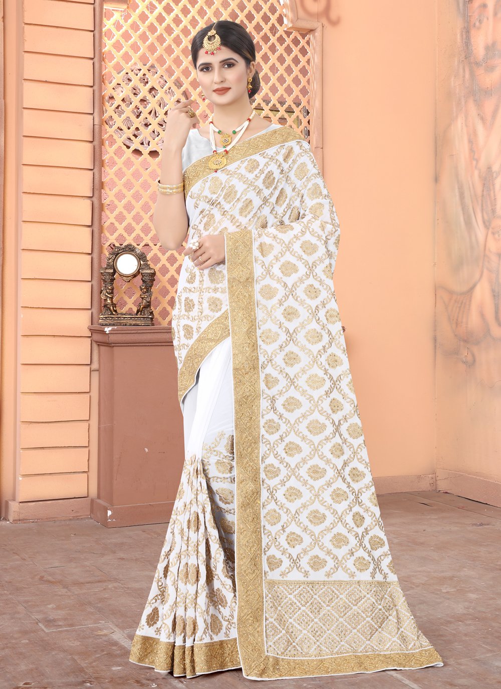 Off White color Faux Georgette Classic Designer Saree with Embroidered