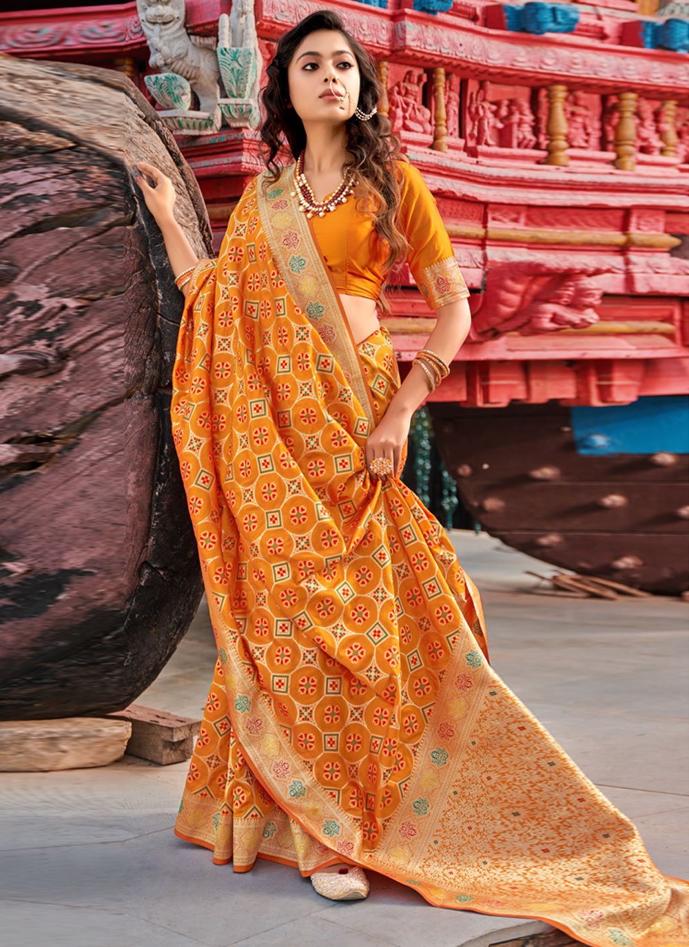 Orange color Banarasi Traditional Saree with Woven