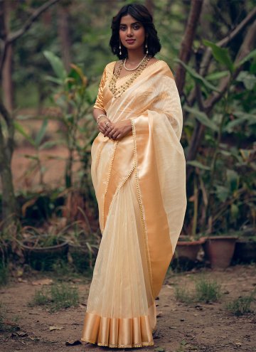 Organza Trendy Saree in Gold Enhanced with Woven