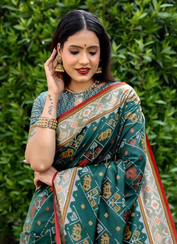 Patola Silk Classic Designer Saree in Green Enhanced with Woven
