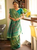 Patola Silk Classic Designer Saree in Green Enhanced with Woven - 1