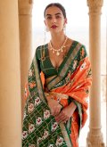 Patola Silk Classic Designer Saree in Orange Enhanced with Woven - 1