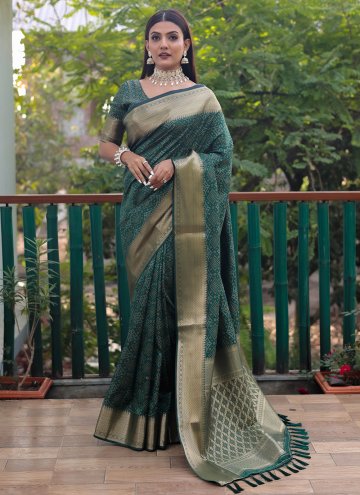 Patola Silk Designer Saree in Green Enhanced with Woven