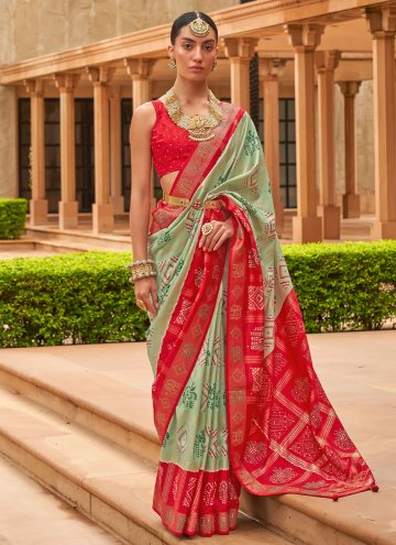 Patola Silk Trendy Saree in Green Enhanced with Wo