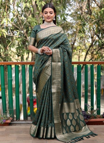 Patola Silk Trendy Saree in Green Enhanced with Woven
