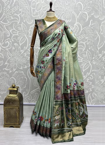 Patola Silk Trendy Saree in Green Enhanced with Woven